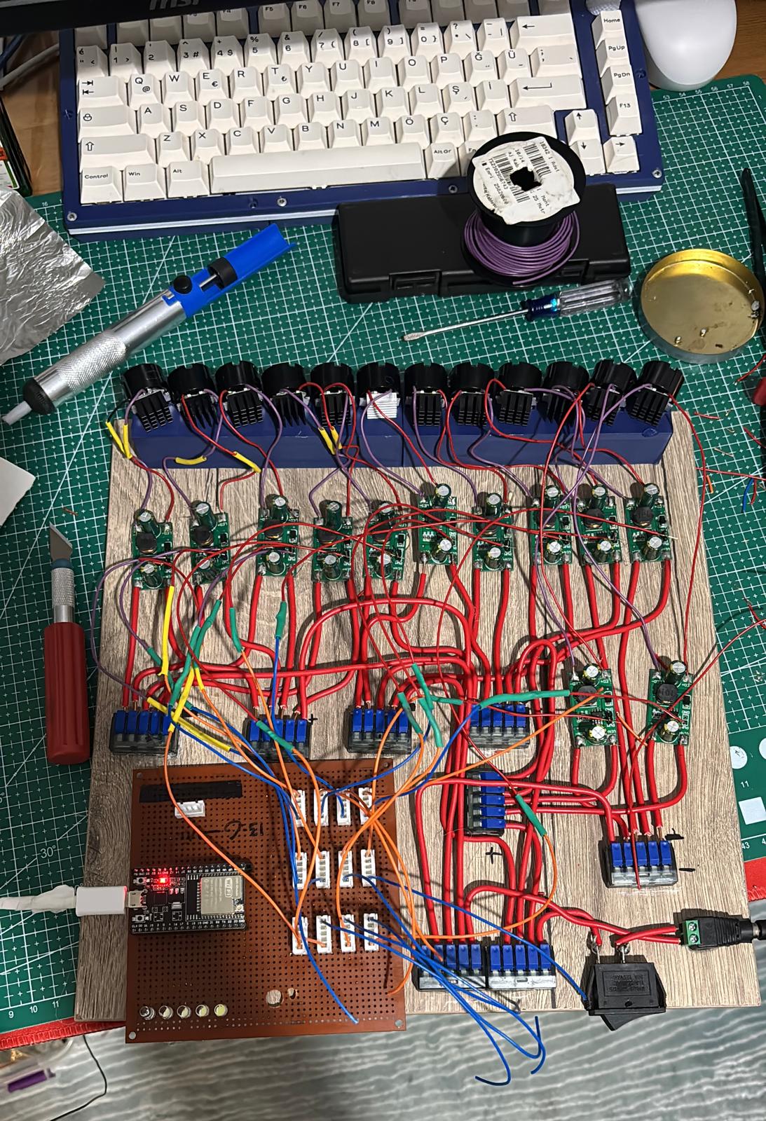 Adaptive Matrix Headlight build: 12 LEDs with heatsinks, a constant-current driver per LED and the ESP32 controller board